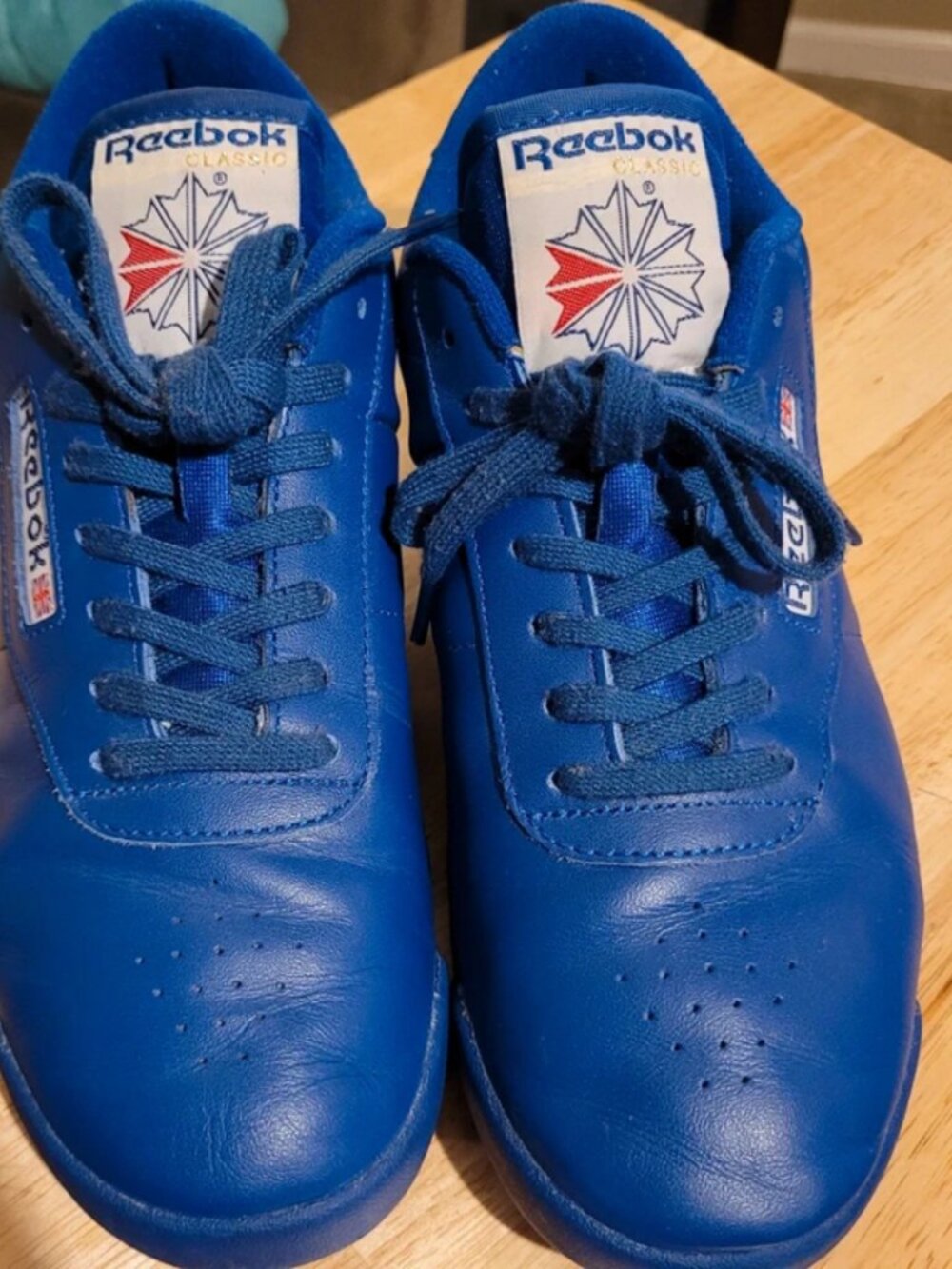 REEBOK classic royal blue leather sneakers